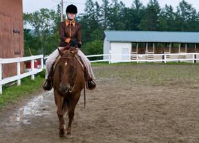 Teen on horseback; photo by Edwin Remsberg, USDA