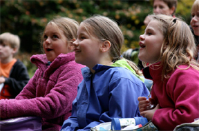 school children enjoying a program at UMaine Extension's 4-H Camp & Learning Center at Tanglewood