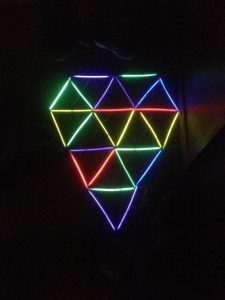 Glowsticks set up in a lattice of connected triangles.