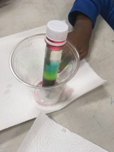test tube with layers of fluids