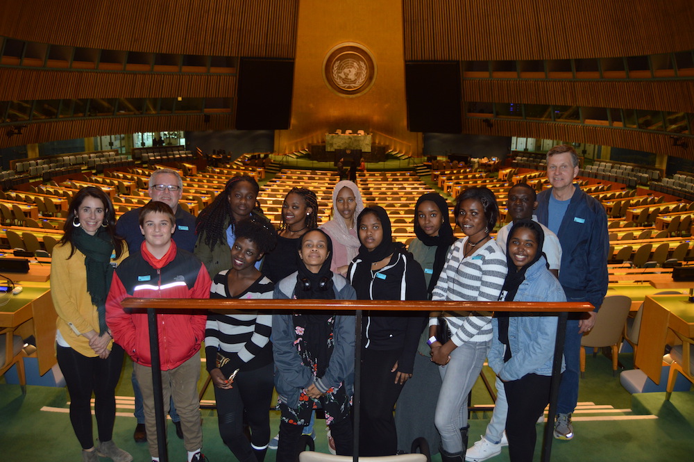 ten teens and chaperone group photo at General Assembly at the United Nations