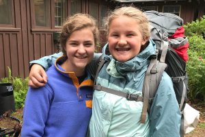4-H campers wearing backpacks about to go on a hike
