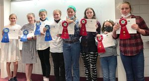 Juniors Group with the certificates and ribbons won at the 4-H Public Speaking event 2022