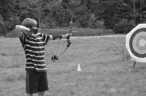 4-H'er practicing archery