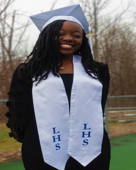 Claudia Cucubica in graduation cap and gown