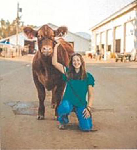 Lily Brown pictured with a cow