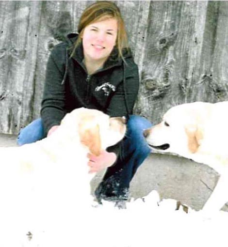 Madelyn Ramsdell with two dogs