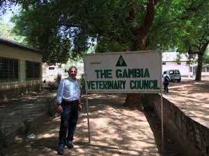 Man poses next to The Gambia Veterinary Council
