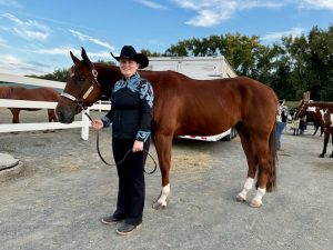 Lola V. posing with her horse at the Big E.