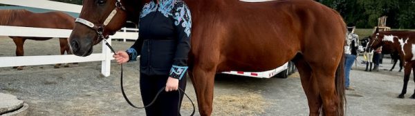 Lola V. posing with her horse at the Big E.