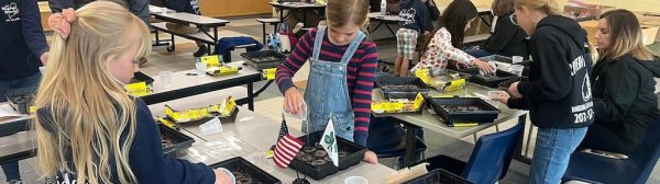 Midcoast Mainers planting seeds.