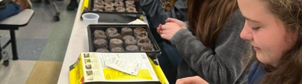 Children planting seeds.