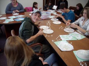 4-H members working on marshmallow science