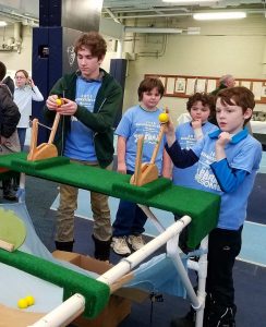 youth using catapaults at the Engineering Expo
