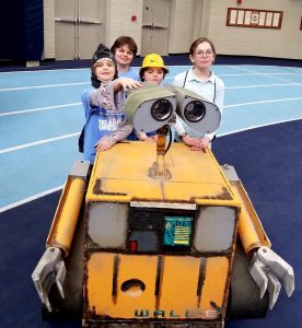 Youth enjoying Walle the robot at the Engineering Expo