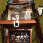 picture of winning belt buckle horse head stall and leg wraps for horse