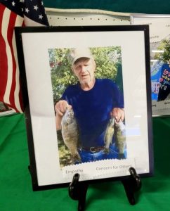 in memory of picture of long time male 4-H volunteer