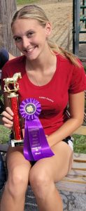 4h member with her trophy