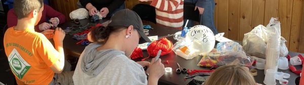 six youth making a craft