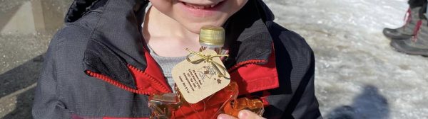 boy with maple syrup