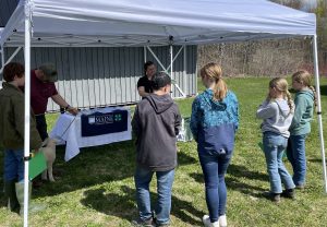 4-H members receiving education about livestock health
