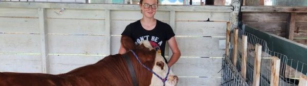 girl and her steer