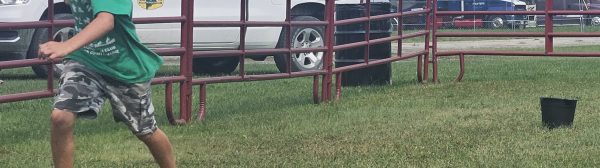 boy running an obstacle course