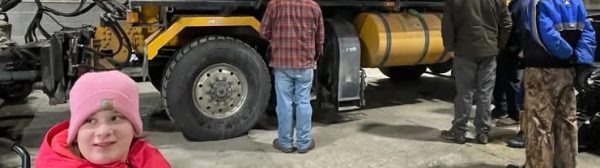 4-h outing at airport equipment to plow snow 3 youth in photo