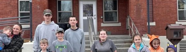 youth checking out the map room at city hall