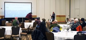 Lily Calderwood speaking at a presentation at the 2023 Wild Blueberry Conference in Bangor