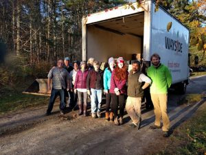 Maine Harvest for Hunger volunteers in front of a food delivery truck