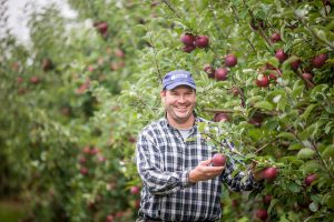 Apple producer in his orchard