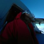 Lynn walking off the plane in Antarctica.