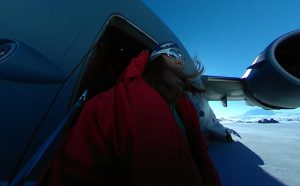 Lynn walking off the plane in Antarctica.