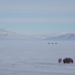 The researchers on the ice with the Yeti robot