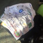 Stack of @UMaineFAR flags