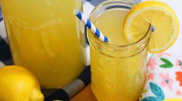 Honey-Sweetened Lemonade in mason jar with sliced lemon