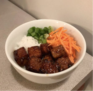 Picture of tempeh with rice and vegetables in a bowl