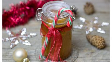 Mason jar with candy cane attached