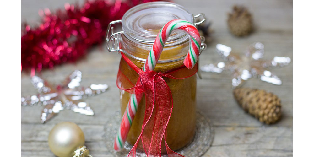 Mason jar with candy cane attached