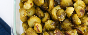 Roasted garlic brussels sprouts in glass dish