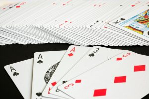 Playing Cards Spread on a Black Surface