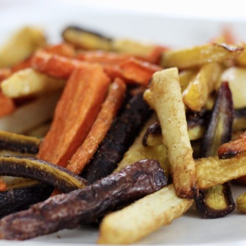 orange, white, and purple carrot fries on a plate