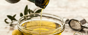 Oil being poured into a dish.