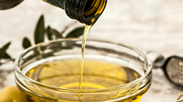 Oil being poured into a dish.