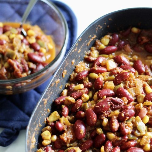 vegetarian chili in a skillet and a bowl