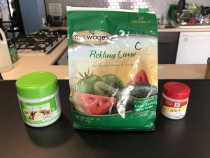 Photo of three products: pickle crisp granules, pickling lime, and alum.