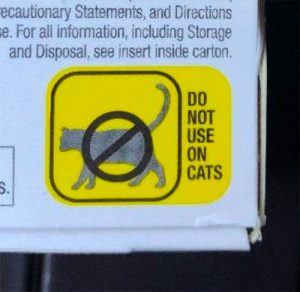 "Do not use on cats" warning label