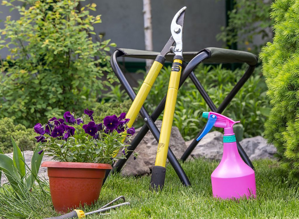 Loppers, geden seat, spray bottle, potted plant, hand hoe