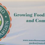 Waterboro Community Garden Sign that says Growing Food, Friendships, and Community